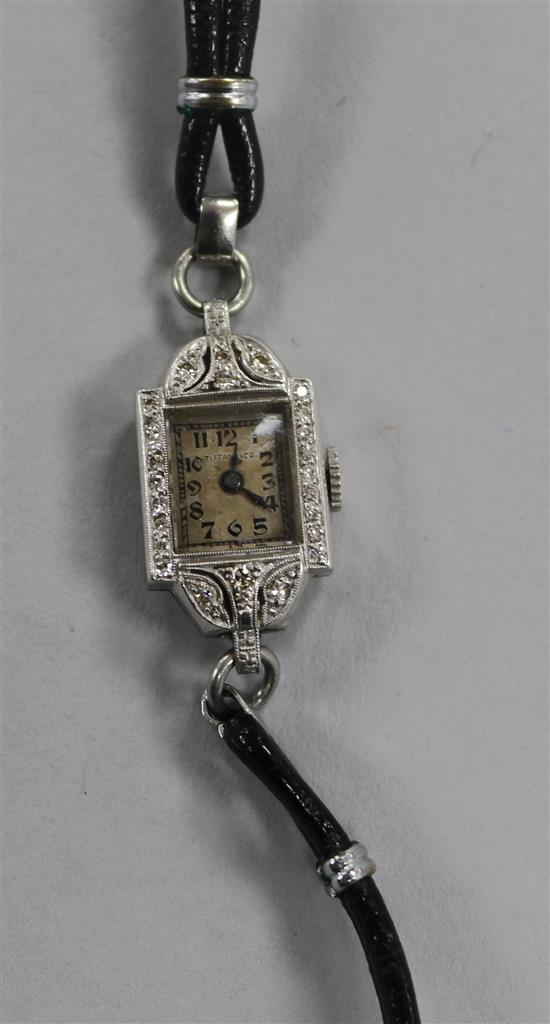 A ladys platinum and diamond set manual wind cocktail watch, retailed by Tiffany & Co.